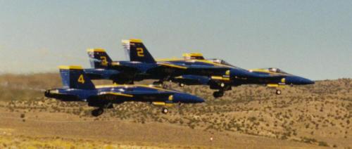 [Blue Angels in close formation]