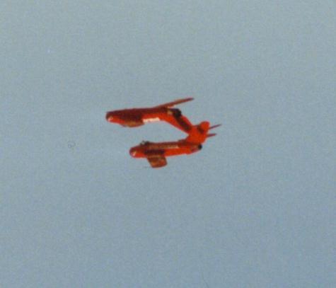 [Mig 15 fighters flying in formation]